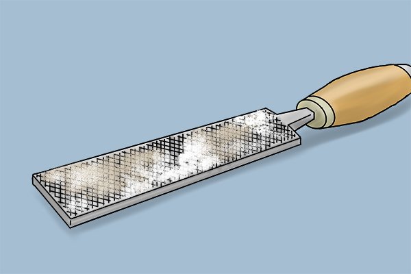 Soft Chips Shorn Off Curl into The Teeth of Files