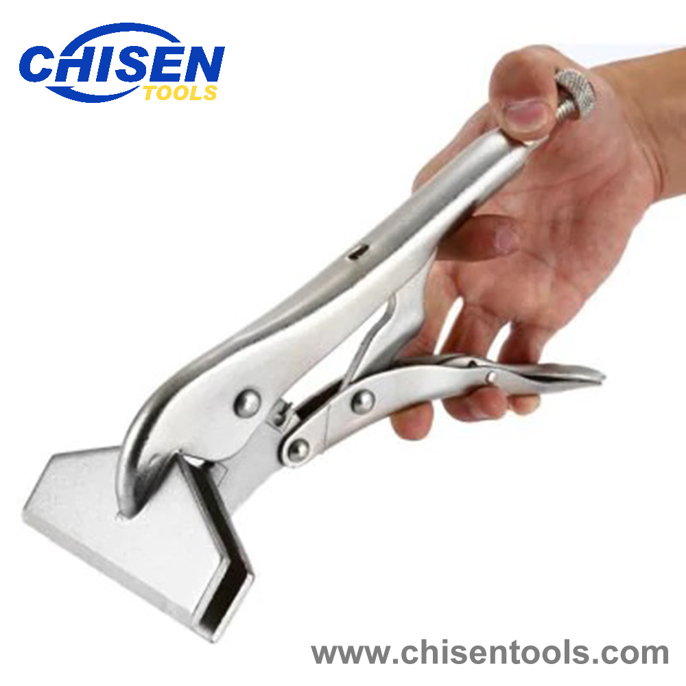 Locking metal sheet clamp pliers in hand.